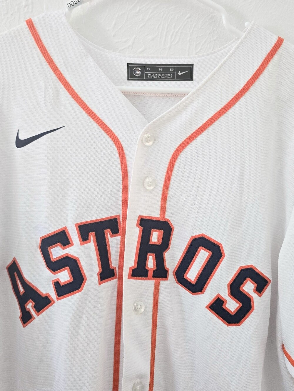 Nike White Astros Baseball Jersey with Orange Trim and Navy Lettering